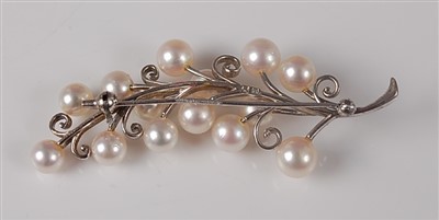 Lot 2616 - A white metal pearl set floral spray brooch,...