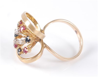 Lot 2613 - A yellow metal multi-stone ruby, sapphire and...