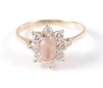 Lot 2615 - An 18ct yellow gold, pink topaz and diamond...