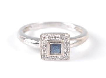 Lot 2631 - An 18ct white gold, sapphire and diamond...