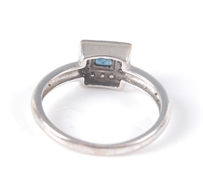 Lot 2631 - An 18ct white gold, sapphire and diamond...