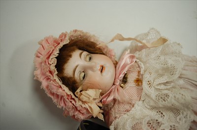 Lot 2001 - A Heinrich Handwerck bisque head doll, having...