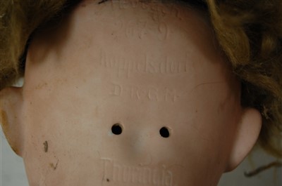 Lot 2023 - A Heubach Köppelsdorf bisque head doll, having...