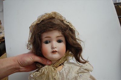 Lot 2024 - A large German bisque head doll, having...
