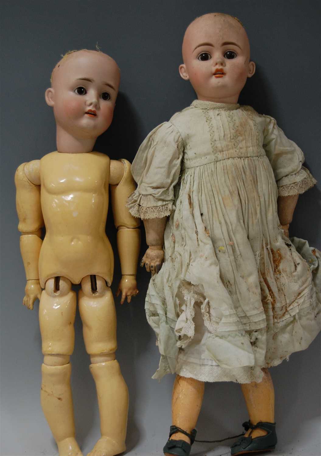 Lot 2026 - A German bisque head doll, having rolling...