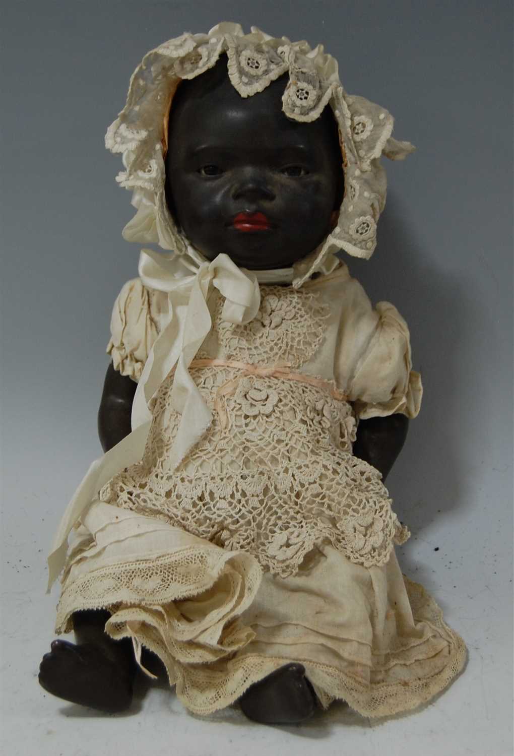Lot 2037 - A Heubach & Köppelsdorf bisque head black doll,...