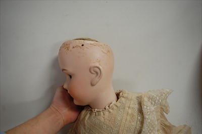 Lot 2040 - A Simon & Halbig bisque head doll, having...