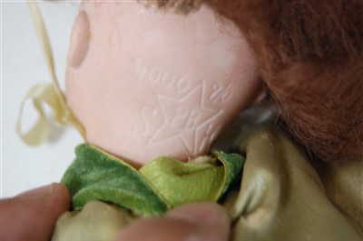 Lot 2044 - A Simon & Halbig bisque head doll, having...