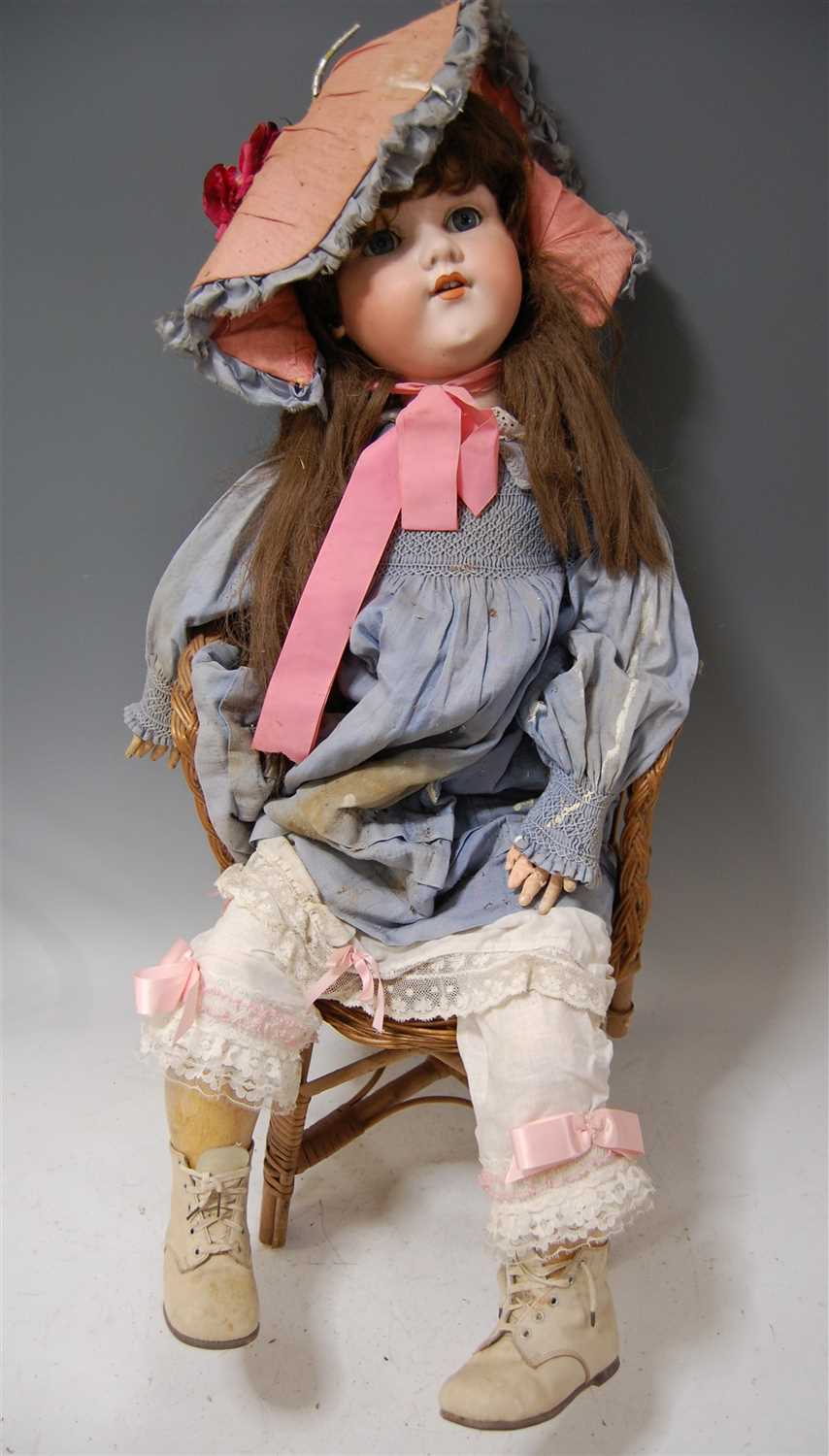 Lot 2047 - A large Armand Marseille bisque head doll,...