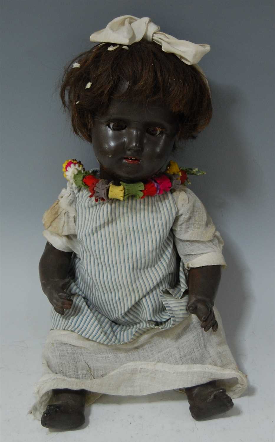 Lot 2049 - A Simon & Halbig bisque head black doll,...