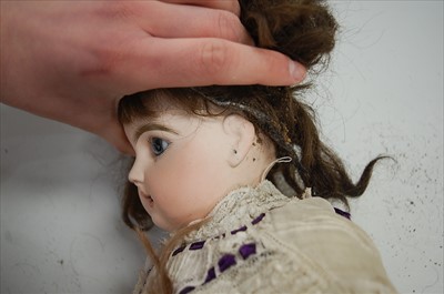 Lot 2062 - An Armand Marseille bisque head doll, eyes...