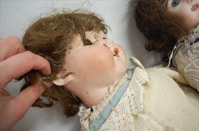 Lot 2062 - An Armand Marseille bisque head doll, eyes...