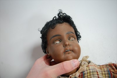Lot 2064 - A Diamond Pottery Company bisque head doll,...
