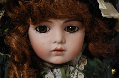 Lot 2065 - A Casimir Bru bisque head doll, having fixed...