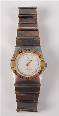 Lot 2650 - A lady's steel and yellow Omega Constellation...