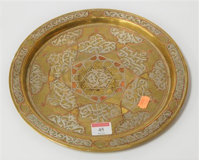 Lot 45 - An Isnik brass shallow tray, with white metal...