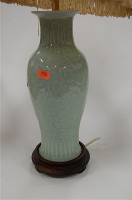 Lot 4 - A Chinese celadon glazed vase of baluster form...