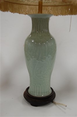 Lot 4 - A Chinese celadon glazed vase of baluster form...