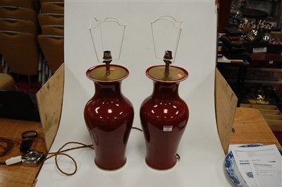 Lot 12 - A pair of Chinese sang de boeuf glazed...
