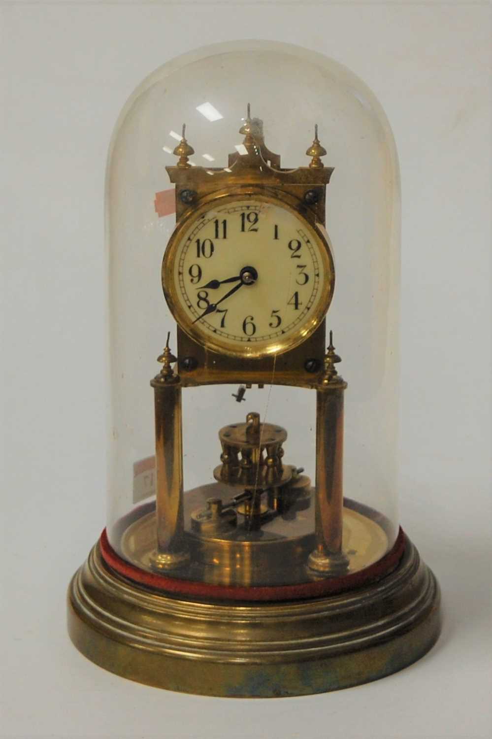 Lot 17 - A lacquered brass anniversary clock under...