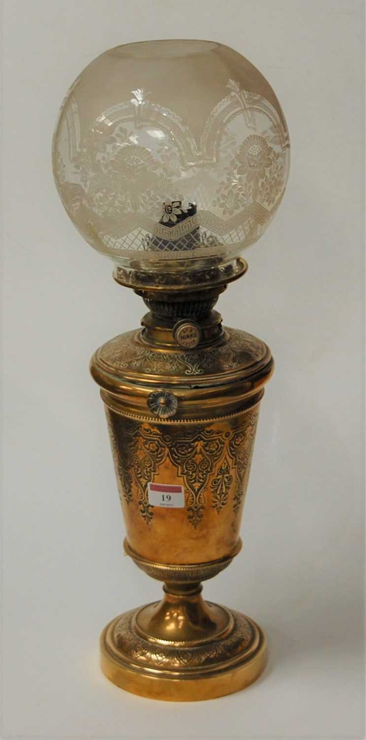 Lot 19 - A late Victorian brass oil lamp having a...
