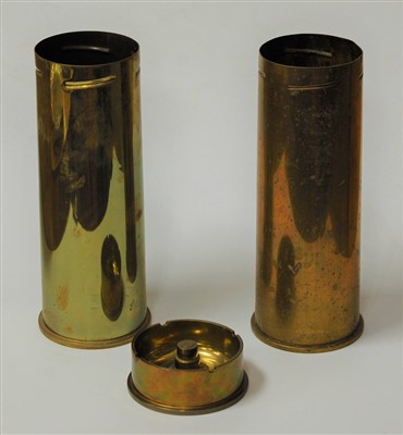 Lot 21 - A pair of trench art brass cannon shell vases,...