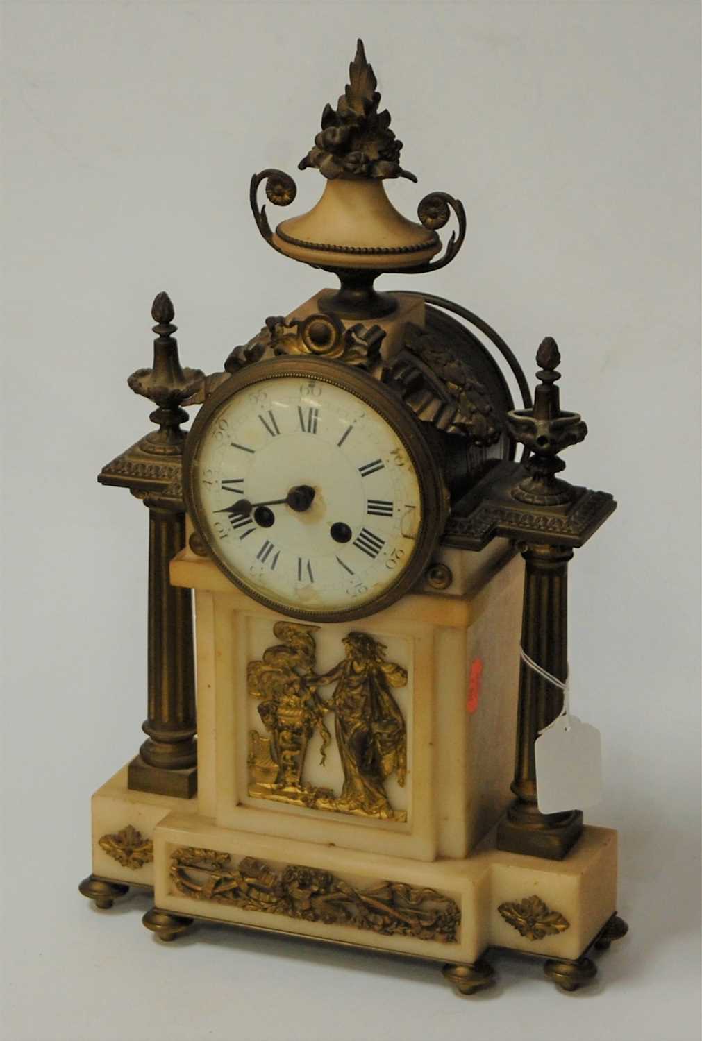 Lot 23 - A mid 19th century gilt metal and marble...