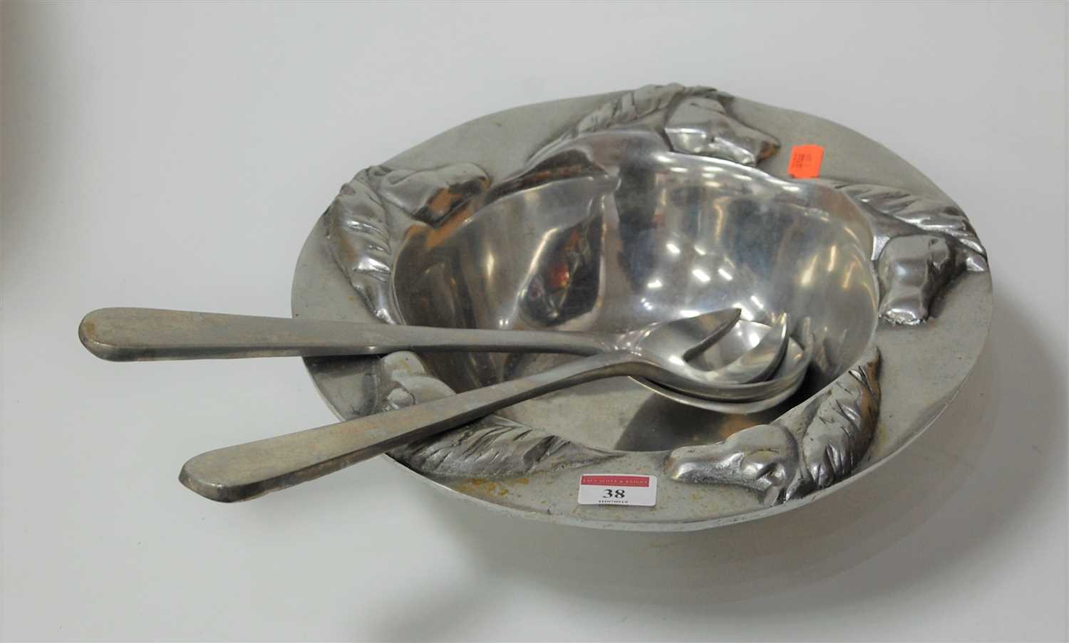 Lot 38 - A contemporary polished metal salad bowl and...