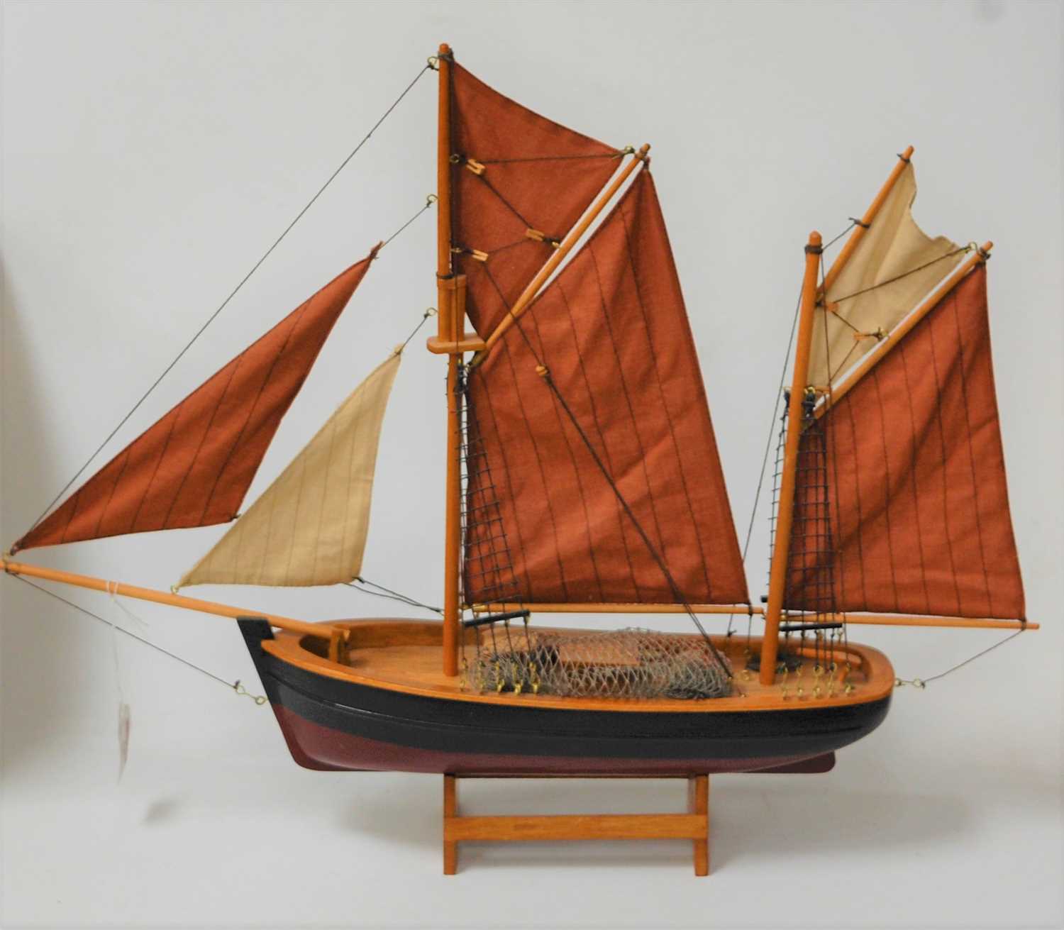 Lot 68 - A scale model of a two-masted boat on stand