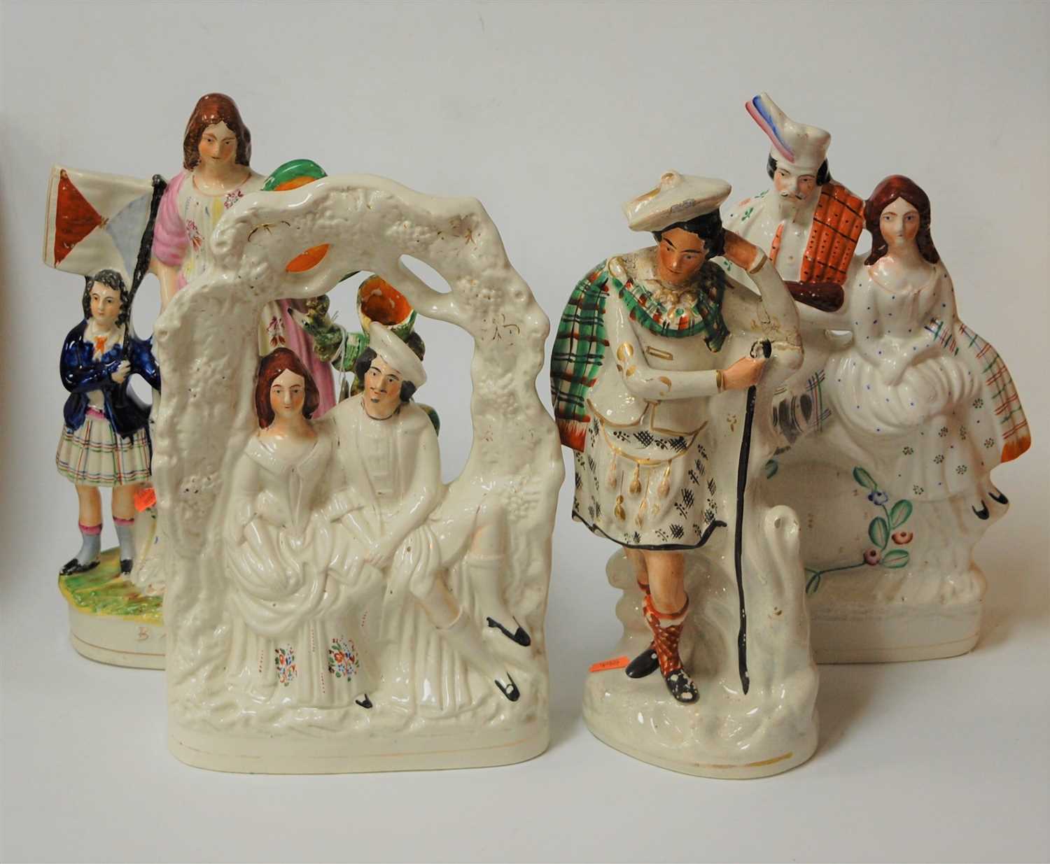 Lot 125 - Four various Victorian Staffordshire figure...