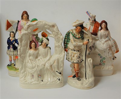Lot 125 - Four various Victorian Staffordshire figure...