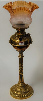 Lot 108 - A late Victorian pedestal oil lamp, having an...