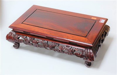 Lot 137 - A Chinese carved hardwood table stand, 42cm