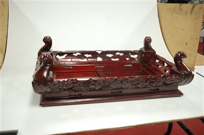 Lot 137 - A Chinese carved hardwood table stand, 42cm