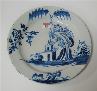 Lot 138 - An 18th century English Delft small charger,...