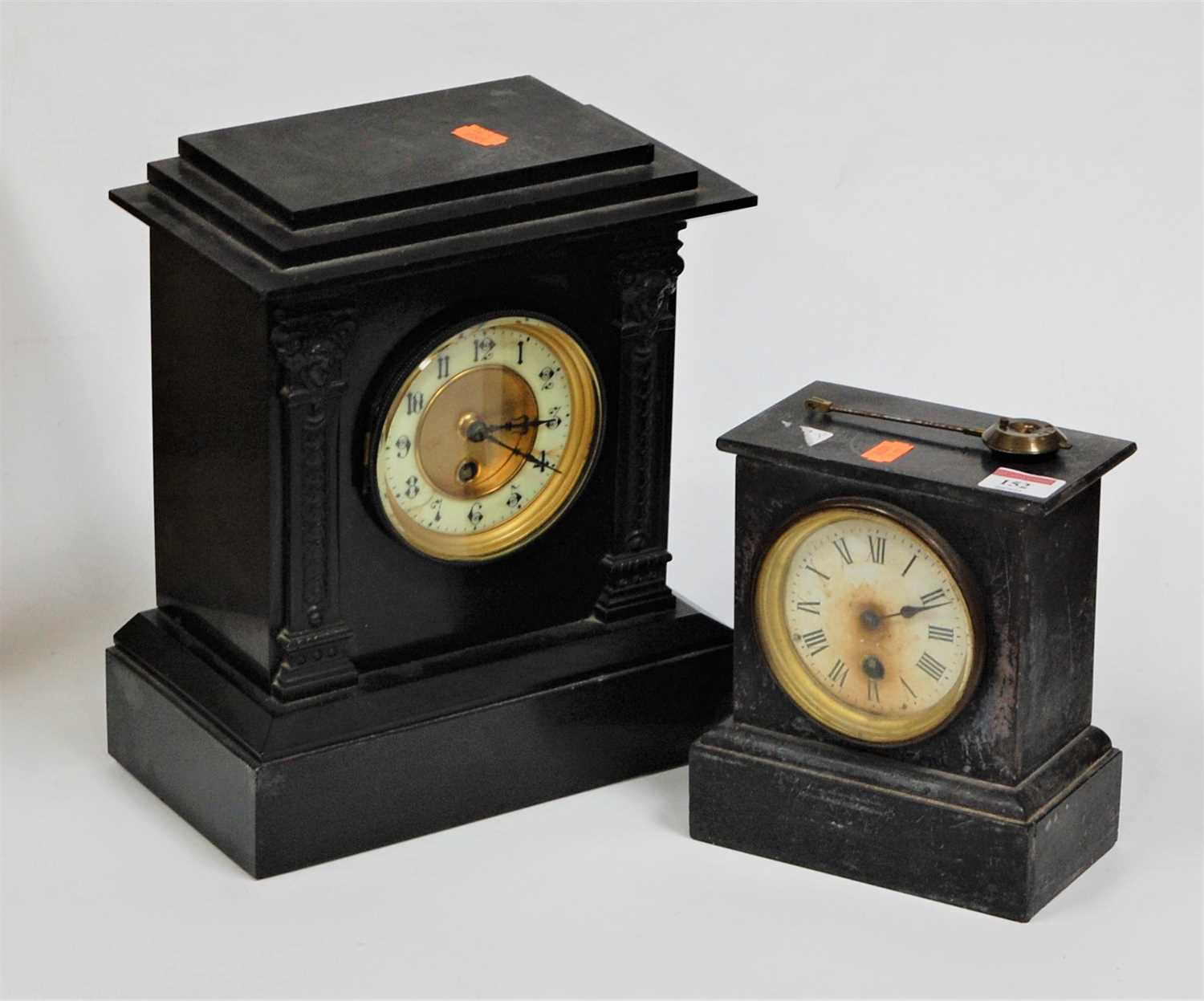 Lot 152 - A circa 1900 black polished slate mantel clock,...