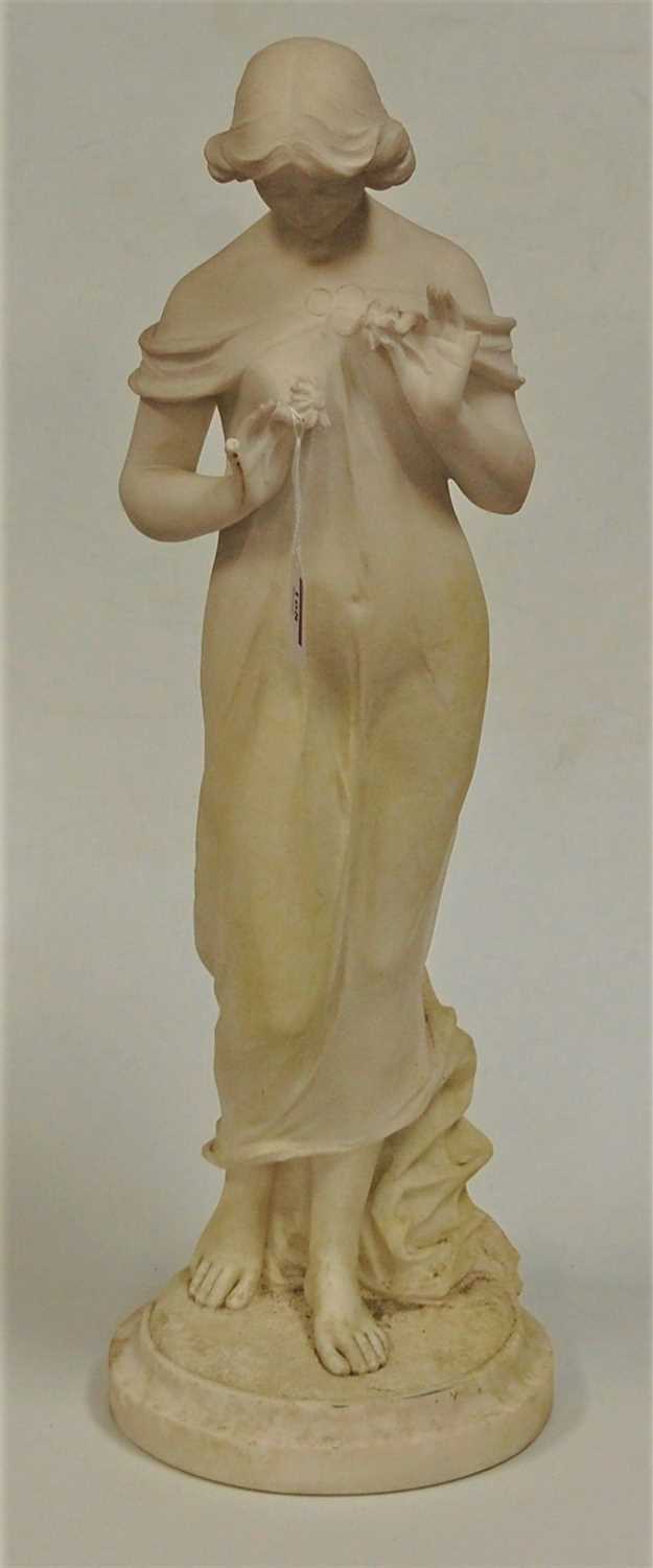 Lot 168 - An early 20th century carved alabaster figure...