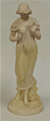 Lot 168 - An early 20th century carved alabaster figure...