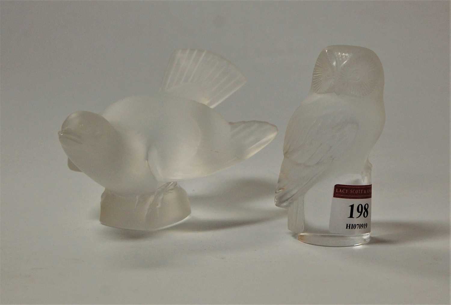 Lot 198 - A Lalique frosted glass owl, h.9cm; together...