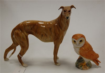 Lot 197 - A model of a greyhound, h.20cm; together with...