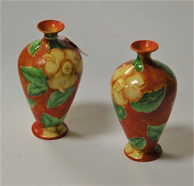 Lot 207 - A pair of Staffordshire baluster vases, by T....