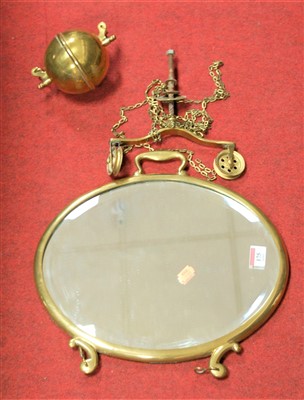 Lot 175 - A brass framed hanging mirror with fittings