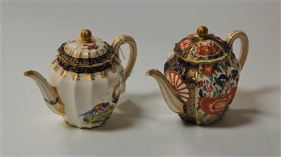 Lot 225 - A pair of Worcester porcelain teapots, each of...
