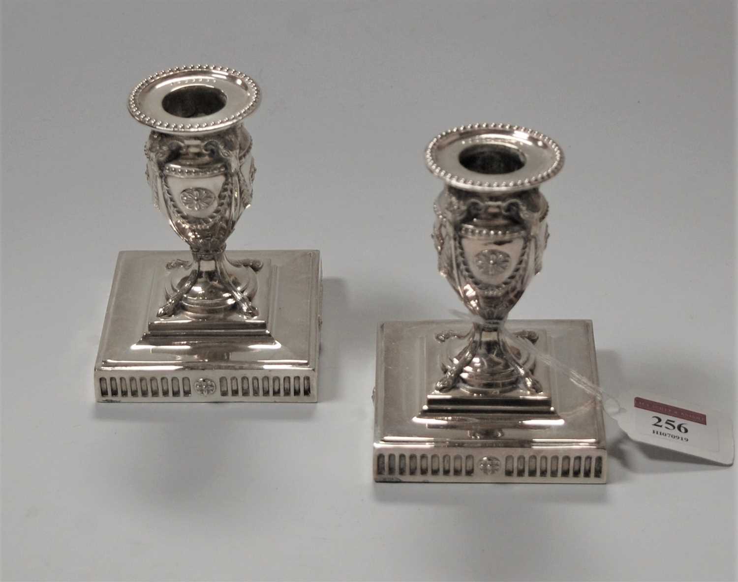 Lot 256 - A pair of Adam style silver plated dwarf...
