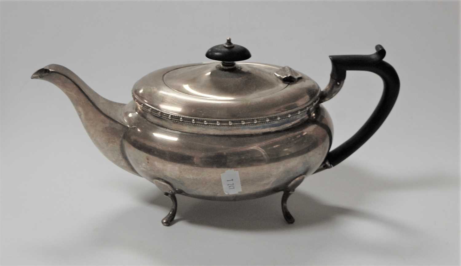 Lot 268 - A 20th century silver boat shaped teapot,...