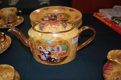 Lot 334 - A china tea set with gypsy scene decoration,...