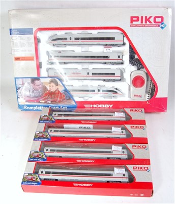 Lot 579 - A Piko H0 DB ICE train 4 coach train pack and...