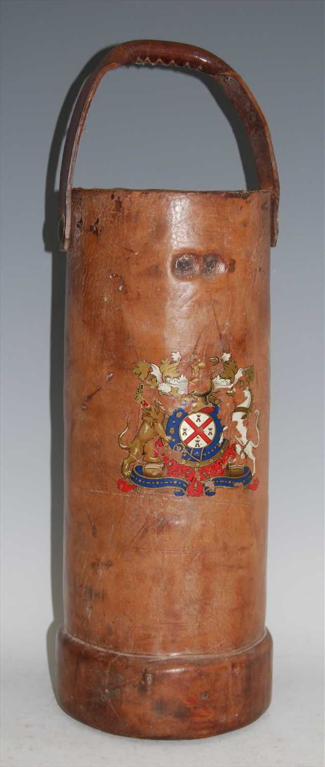 Lot 196 - An early 20th century canvas and leather covered charge carrier