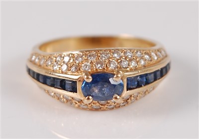 Lot 2665 - An 18ct yellow gold, sapphire and diamond...
