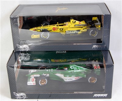 Lot 2549 - Five various boxed 1/18 scale F1 racing...